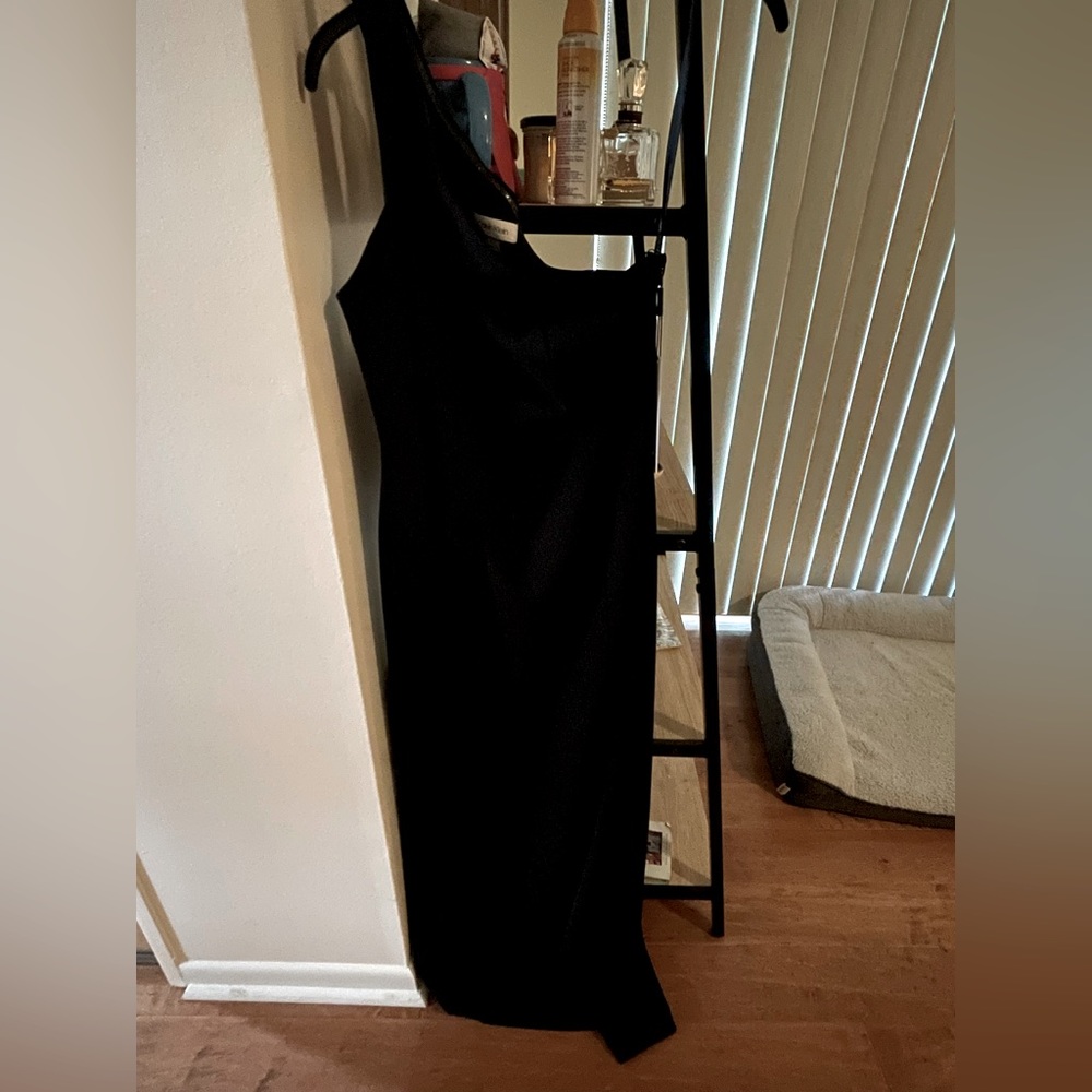 Black, never used, WITH TAG, one shoulder Calvin Klein dress.